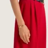Bransoletka typu mankiet z linii Givenchy Tape, wykonana z metalu i emalii Bransoletka typu mankiet z linii Givenchy Tape, wykonana z metalu i emalii