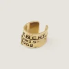 Kolczyk typu earcuff Givenchy Tape z metalu i emalii Kolczyk typu earcuff Givenchy Tape z metalu i emalii