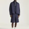 Kurtka z haftowanym napisem „Givenchy Paris” z dżinsu z szwami w stylu couture Kurtka z haftowanym napisem „Givenchy Paris” z dżinsu z szwami w stylu couture