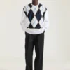 Sweter z dzianiny w romby z charakterystycznymi szwami Sweter z dzianiny w romby z charakterystycznymi szwami